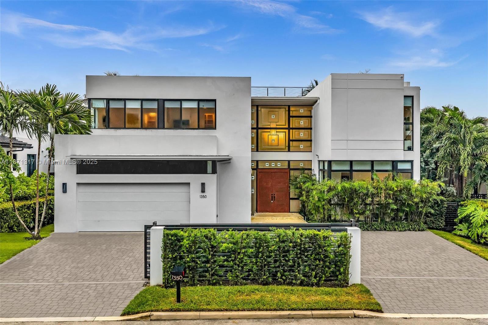 Rare rental opportunity in the highly sought-after Bay Harbor Islands community. This beautiful house offers 7 bedrooms and 7.5 bathrooms across 5,300 SF of luxurious living space on a 10,000 SF lot. Designed with exceptional attention to detail, the home welcomes you with soaring double-height ceilings and expansive sliding impact glass doors that open to your private backyard oasis with a Jacuzzi and pool.
Fully furnished and move-in ready, this residence boasts a Sub-Zero refrigerator, premium appliances, rooftop terrace, elevator, covered patio, and 2-car garage.