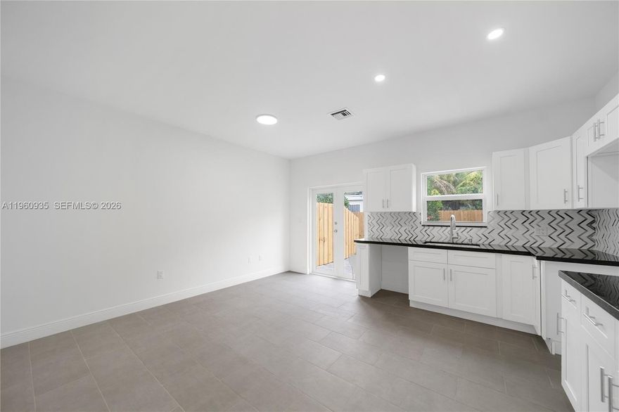 Brand new construction modern townhome in Buena Vista Gardens. Designed with comfort and style, it features 3 bedrooms with 2 full and 1 half bathrooms. Bright open spaces, soaring ceilings and a sleek chef’s kitchen with premium finishes. Impact windows and doors. Upstairs the primary suite offers a luxurious retreat. Gated fence around the community with motarized entry to the property. Just minutes from the Miami Design District, Upper Buena Vista, Wynwood and Midtown, this residence places you near Miami’s top destinations. Secure parking and modern curb appeal complete the home. Sale options purchase individually or acquire 4 identical townhomes together ideal for an end user compound or investor seeking a turnkey property in a fast growing neighborhood.