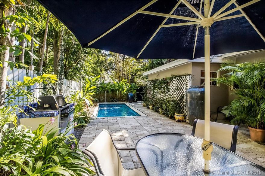 YOUR PERFECT NORTH GROVE RETREAT. THIS HOME HAS IT ALL. THE LOCATION AND ARCHITECTURAL STYLE EVERY BUYER IS LOOKING FOR.  COMPLETELY PRIVATE, UPDATED WALLED AND GATED MODERN BUNGALOW BEAUTIFULLY LANDSCAPED EXTERIOR COMPLEMENTS THE TROPICAL POOL AND PATIO WITH BUILT IN BBQ. A MOSQUITO SYSTEM ALLOWS YEAR-ROUND ACCESS. AND A SCREEN ENCLOSED HOT TUB BRINGS ANOTHER DIMENSION TO OUTSIDE LIVING. WORKING FIREPLACE, FORMAL DINING, LAUNDRY ROOM, FAMILY ROOM, REDONE KITCHEN WITH GAS STOVE AND A ROOF ABOUT A YEAR OLD. ONE CAR GARAGE. WALK TO WATER, BUT NOT IN A FLOOD ZONE.