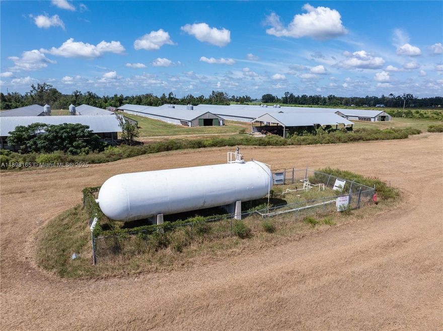 This working 62.33-ac. poultry broiler farm includes farm wells, septic tanks, seven 43' x 510' broiler houses, an eighth pad for a potential new broiler house, 50' x 80' litter storage building, 50' x 150' litter storage building, generator system and building, 30,000-gallon propane tank and infrastructure, 50' x 70' maintenance building, and one site-built residence. Approximately 33.20 ac. and poultry improvements have a list price of $1,615,000.