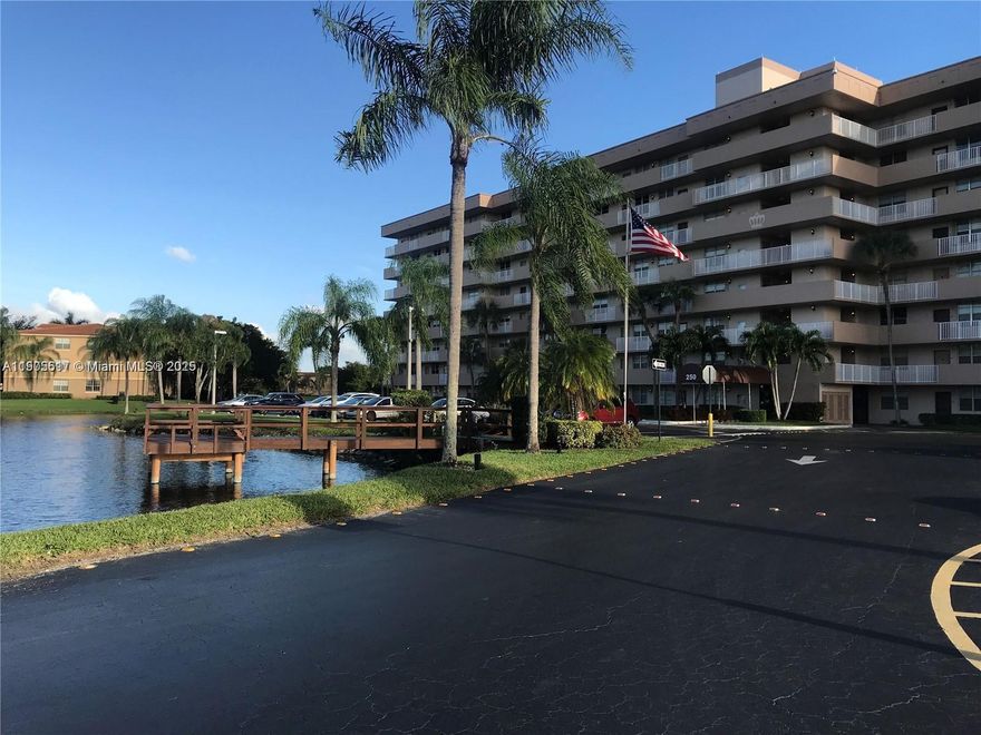 INVESTORS, GREAT OPPORTUNITY.  A Fabulous location near shopping centers, banks, restaurants, churches, and both public and private schools. This amazing condominium overlooks the lake and Jacaranda Golf Club, offering a peaceful and scenic setting. Perfect for peaceful mornings or sunset relaxation with a view. Features include hurricane-impact windows, laminate flooring in living, dining areas and bedrooms, and a screened balcony with golf course view. Building has completed all 40-year recertifications, including ceilings, full painting, and plumbing. Secure card access, ample guest and second-vehicle parking. Renting allowed from the first year, and corporations are welcome.