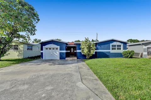 Photo of 7221 Fairway Blvd, Miramar, FL 33023 (MLS # A12077383)