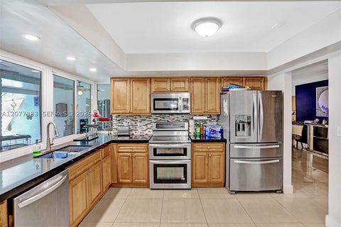 Tiny photo for 7221 Fairway Blvd, Miramar, FL 33023 (MLS # A12077383)