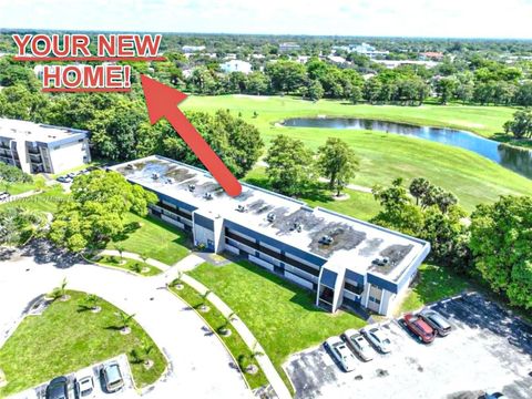 Photo of 7911 N Colony Cir N #202, Tamarac, FL 33321 (MLS # A11897041)