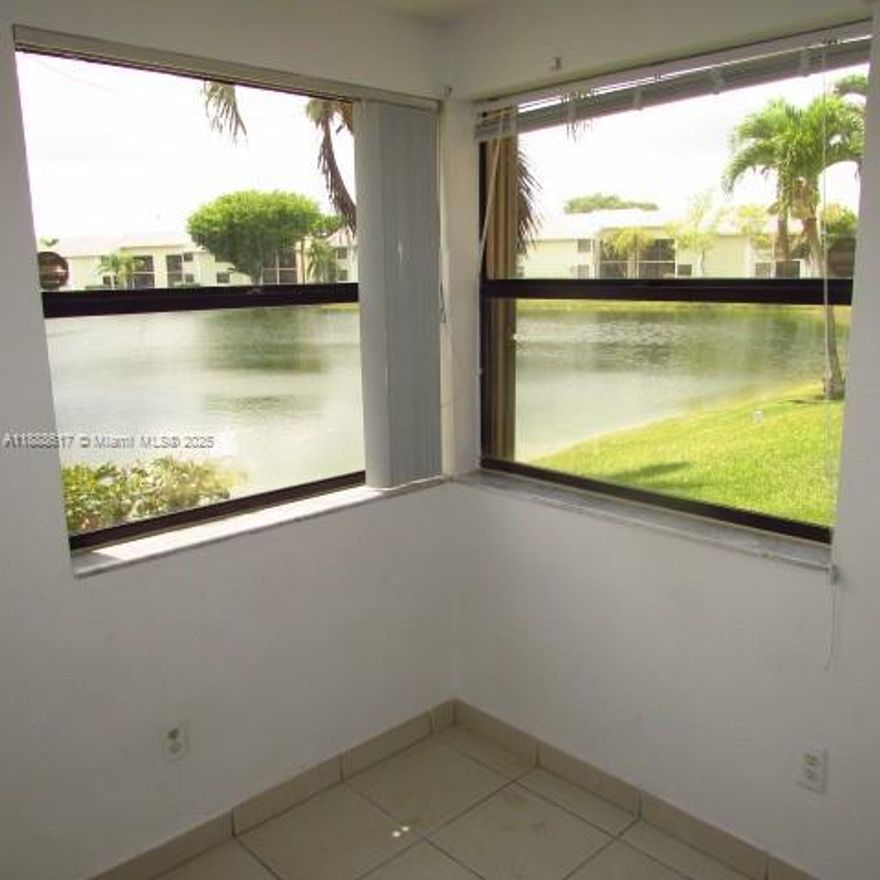 Direct water view from almost all windows of one of the largest lakes in Dade.  All tile floors, washer, dryer inside, screened balcony, extra storage closets, assigned parking and plenty of guest spots.  Gated community with management inside, amenities.  East of the Turnpike.