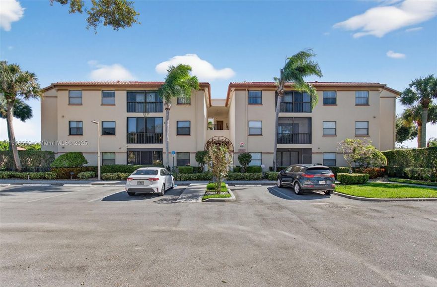 Beautiful 3-bed, 2-bath condo in desirable Excellente Village of the resort-style Platina all ages community. This spacious 3rd-floor unit features vaulted ceilings, filling the home with natural light and an open, airy feel. Modern finishes, fresh paint, and a gorgeous kitchen with sleek cabinetry and contemporary design. The split-bedroom layout offers privacy, while the private screened patio provides a peaceful retreat. Additional highlights include a 2020 A/C unit, impact windows in all bedrooms and a brand new elevator in the building. Located in a gated, country club–style community with no membership required.  This unit is directly across from the clubhouse, pools, tennis, fitness center, café, and more. A perfect blend of comfort, style, and convenience!