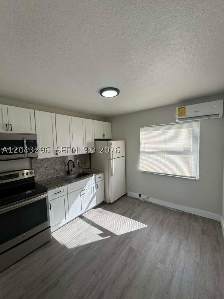 Photo of Riviera Beach, FL 33404 (MLS # A12043296)