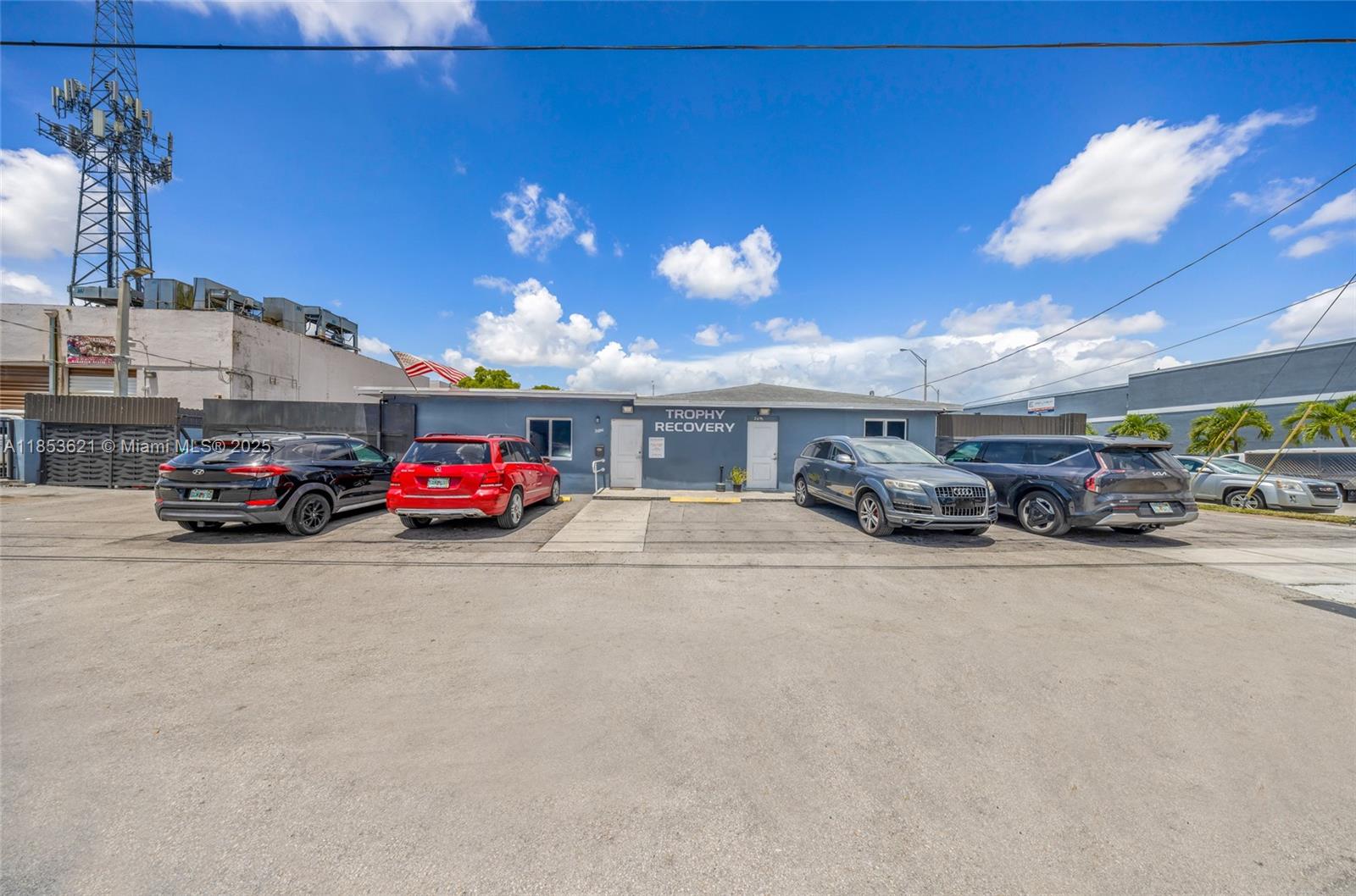 High-exposure corner industrial site totaling 18,950 SF of land with a 1,865 SF building, fully paved and fenced. Two adjacent folios being sold together, both zoned industrial. Excellent opportunity for owner-users or investors seeking yard space in a high-demand market. Located on a prominent corner with dual street frontage, ideal for operational flow and visibility. Close proximity to major roadways and industrial corridors. Rare find with this much usable land in such a strategic location