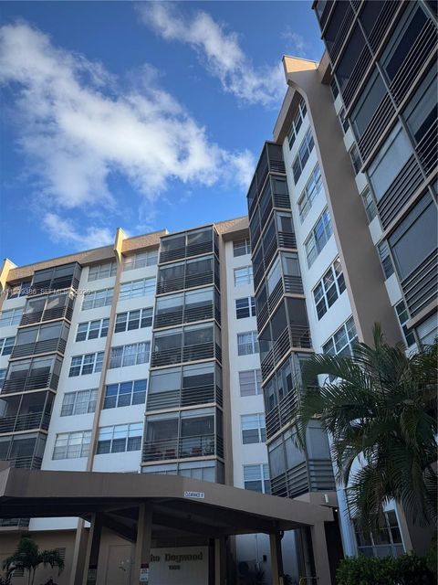 Photo of 1100 Saint Charles Pl #203, Pembroke Pines, FL 33026 (MLS # A11939386)