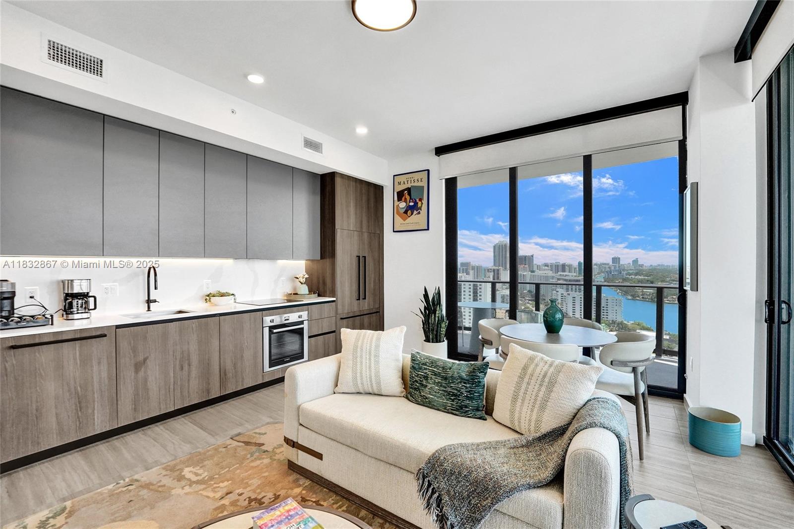Step into effortless elegance at 72 Park in North Beach. This fully furnished 2-bedroom, 2-bath corner residence features floor-to-ceiling windows, designer finishes, a modern kitchen with quartz countertops, and a private balcony with sweeping city and ocean views. Offered turn-key for seasonal, monthly, or long-term rental—just bring your suitcase. Enjoy world-class amenities: rooftop pool, state-of-the-art fitness center, 24/7 concierge, co-working lounge, on-site dining, and direct beach access. Pet-friendly and includes assigned parking.
Unbeatable location at Collins Ave & 72nd Street—walk to the beach, shops, and cafés. Minutes to Bal Harbour, South Beach, and Miami International Airport. Flexible lease terms.