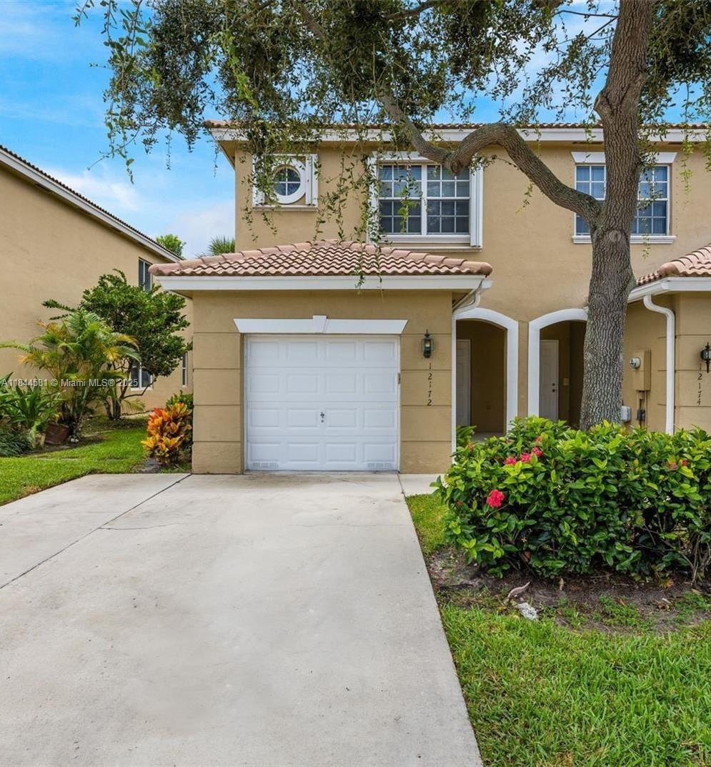 Gorgeous CORNER Townhouse, 3 Bedrooms and 2.5 Baths. Share a "Jack & Jill" bathroom with dual sinks. Backyard with peaceful lake views, one single covered garage with Automatic Door Opener. 1st floor and 2nd floor with laminate floors. Kitchen granite countertop, stainless steel appliances. Partial Accordion Shutters. Pelican Pointe is a gated community that is conveniently located near shopping Mall, restaurants, Supermarket, parks.