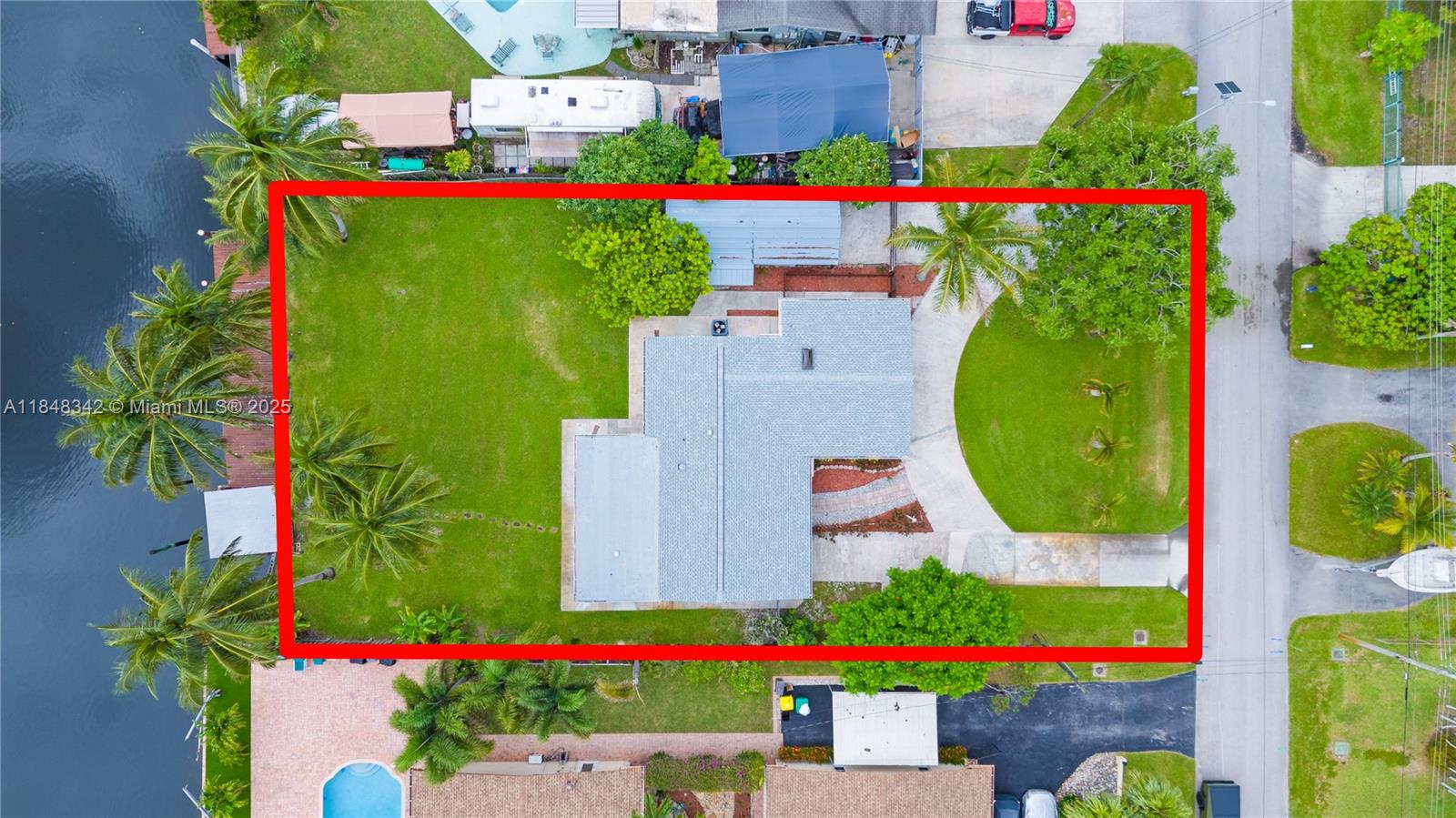 Rare waterfront gem w/ versatility and value! Nestled on an expansive lot, this upgraded 3BR/2BA home plus a fully remodeled in-law suite offers the perfect blend of lifestyle, comfort, and investment potential. Boaters will love the private dock w/ direct ocean access—an incredible find—with ample space for storing a boat, RV, or additional vehicles. Enjoy the oversized yard, ideal for outdoor living, play areas, or even future additions. Investors take note, the in-law suite provides a turnkey rental opportunity to help offset expenses or generate passive income. Recent upgrades include a new roof (Dec. 2024), quartz counters, new SS appliances, impact windows/doors, premium flooring, and a 5-ton AC. Just minutes to Hard Rock Casino, beaches and shopping.