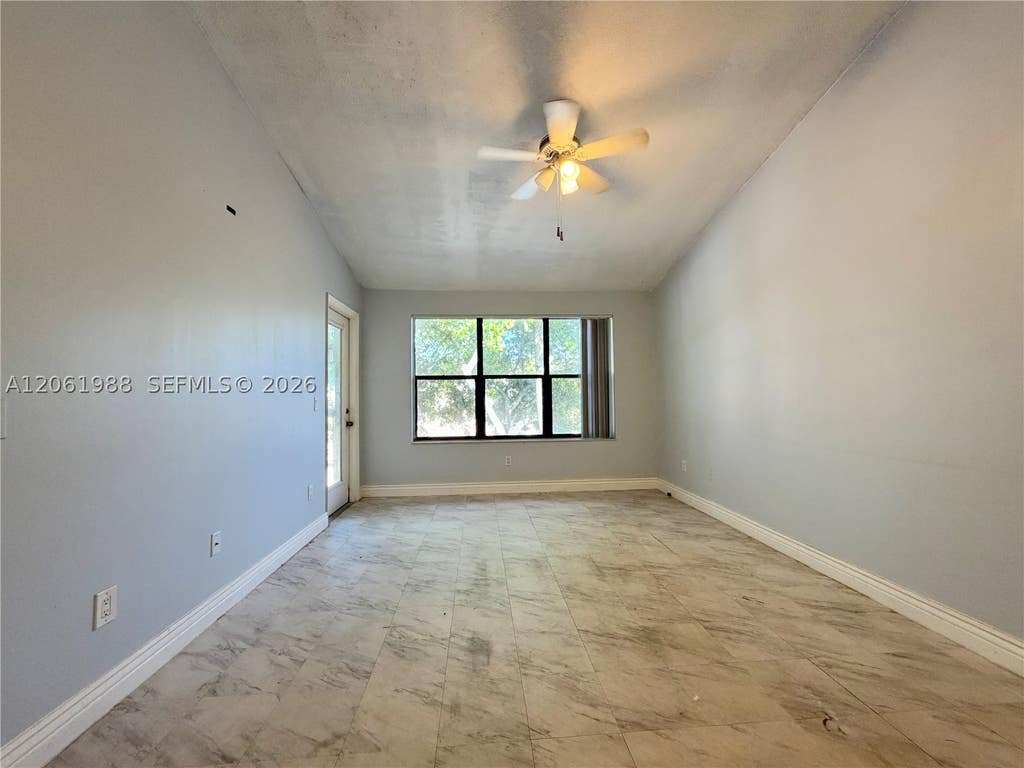 Photo of 4441 W Mcnab Rd #21, Pompano Beach, FL 33069 (MLS # A12061988)