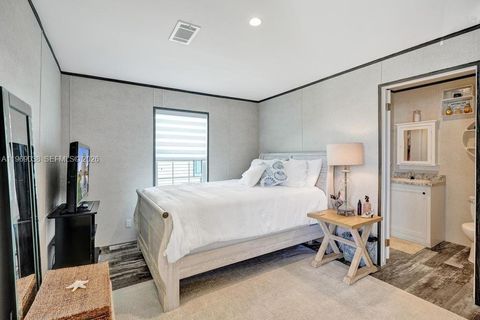 Photo of 315 NE Cardinal Lane Unit Lot L25, Jensen Beach, FL 34957 (MLS # A11969038)