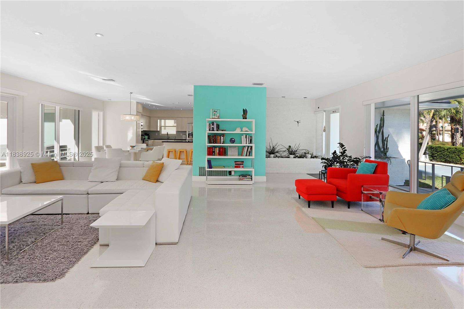 Just minutes from the beach, this stunning 3-bedroom, 2-bath home in the highly sought-after Hollywood Lakes neighborhood blends timeless style with modern upgrades. Step into an open, light-filled layout featuring beautifully preserved terrazzo floors and a desirable split-bedroom floor plan for added privacy. Enjoy a NEW roof, heated pool, and a spacious paved patio perfect for entertaining or soaking up the Florida sun in your private, fenced backyard. Impact windows and doors offer peace of mind, while custom built-in closets and a generous 2-car garage add comfort and convenience. Whether you're looking for a move-in-ready retreat or a fantastic investment opportunity near the coast, this home delivers. Don't miss your chance to make it yours!