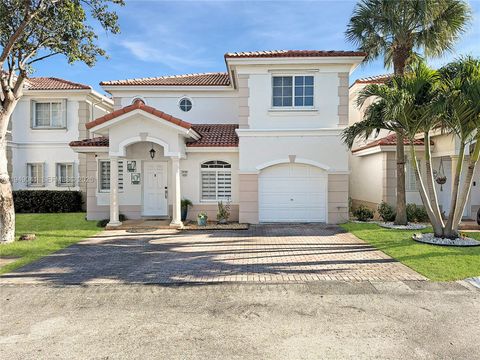 Photo of 7355 NW 173rd Dr #103, Hialeah, FL 33015 (MLS # A11949041)