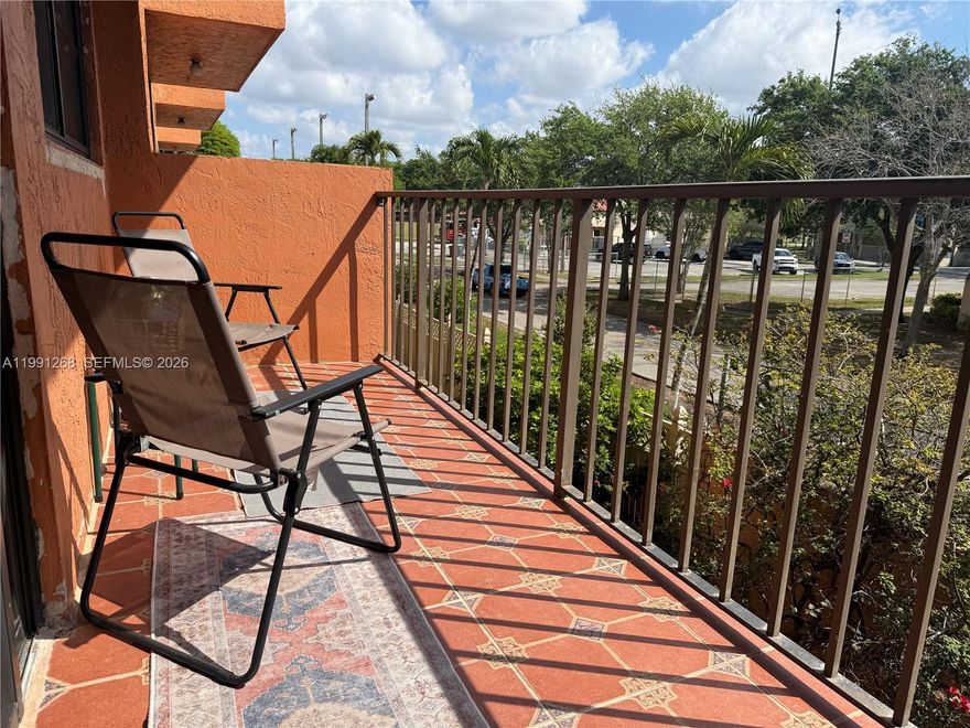 Welcome to Westland Condo in West Hialeah! Bright and spacious corner unit featuring 1 bedroom and 1 bathroom, with tile flooring throughout and a walk-in closet. Enjoy the convenience of an in-unit washer and dryer, an ample kitchen, and a private balcony overlooking tree-lined streets. Located directly across from Wilde Park, offering green space, walking paths, and outdoor recreation right at your doorstep. Includes assigned parking plus plenty of guest parking. The community offers a pool and secure building entry. Great location, comfort, and lifestyle all in one—move-in ready! Call today to view it.