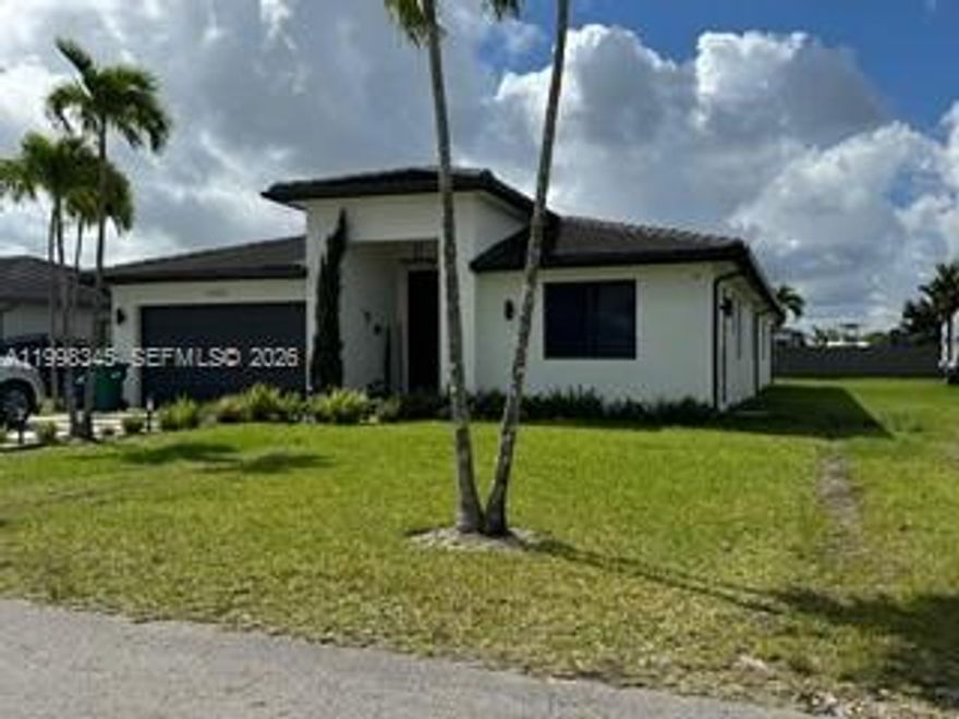 Fantastic 5-bedroom, 4.5-bath home located in Miami, offering generous living space and sitting on an oversized 14,000 sq ft lot. Perfectly situated with easy access to Kendall and the Florida Keys, this property combines comfort, space, and convenience.

Built with modern construction standards, the home features impact windows and doors for enhanced storm protection and energy efficiency. Inside, you’ll find a bright and open floor plan with porcelain tile throughout, creating a clean and elegant flow.

The spacious kitchen is designed for both everyday living and entertaining, featuring quartz countertops, stainless steel appliances, and ample space for a full dining area. The primary suite offers a relaxing retreat with a soaking tub, a large walk-in shower, and custom-built closets.

Four additional bedrooms and 3.5 bathrooms provide flexible options for family living, guests, or a home office setup.

The expansive backyard offers endless possibilities with plenty of room to build your dream pool and create a custom outdoor entertainment area. The oversized lot also provides ample space for RV or boat parking.

A two-car garage plus an extended driveway provides ample parking for multiple vehicles.

A perfect blend of modern finishes, functional layout, and oversized lot—ready to enjoy the best of South Florida living.

NEW PHOTOS COMING SOON.