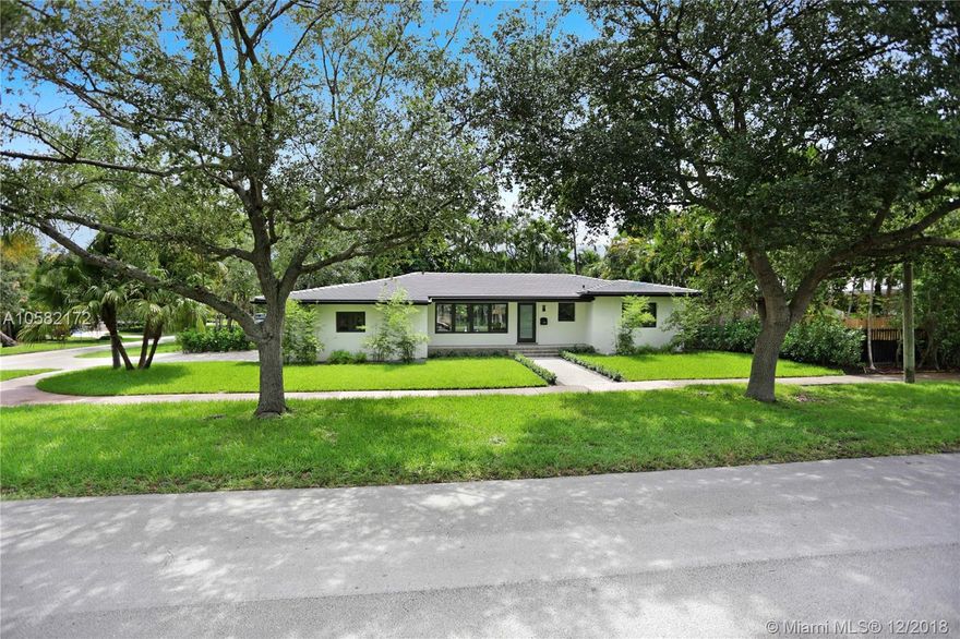 No expense was spared in this impeccably designed 3- bedroom, 3- bathroom home located on a quiet, tree-shaded street in the heart of Coral Gables. The fully upgraded and completely remodeled corner lot residence features all brand new kitchen appliances, impact windows and doors, roof, interior drywall and floors, paver driveway and sidewalks with an expansive right away walkways and a 2-car garage. A spacious and open floor plan extends to grand entertainment outdoor spaces. Expansive sliding doors fill the home with an abundance of natural light, providing a seamless transition from the interior to exterior. The recently resurfaced saltwater treated pool and paver deck features brand new tile and LED color lights, providing the perfect outdoor ambiance.