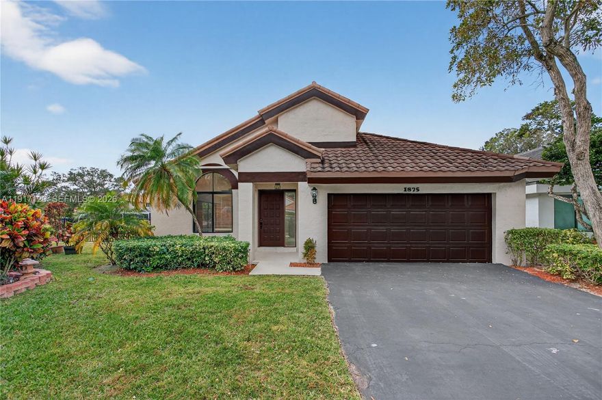 Stunning lakefront pool home on a cul-de-sac in desirable Cross Creek in Plantation.  Impeccably maintained home located in one of Plantation’s most desirable neighborhoods. Featuring a bright, open layout, this property offers the perfect blend of comfort, style, and South Florida living. Step inside to a spacious main living area filled with natural light, freshly painted interior and exterior, and a seamless flow ideal for both daily living and entertaining. The kitchen features direct views of the backyard. The three bedrooms are generously sized, and the primary suite includes its own private jacuzzi bath and access to the lanai and pool area.  Outside, enjoy a generous fenced-in yard with a salt water waterfall slate pool, and plenty of room for kids, pets, gardening and grilling. 50 year Metal Dura Loc roofing system .  Centrally located. Close to major highways, Sawgrass Mills Mall, fine dining, restaurants & more!