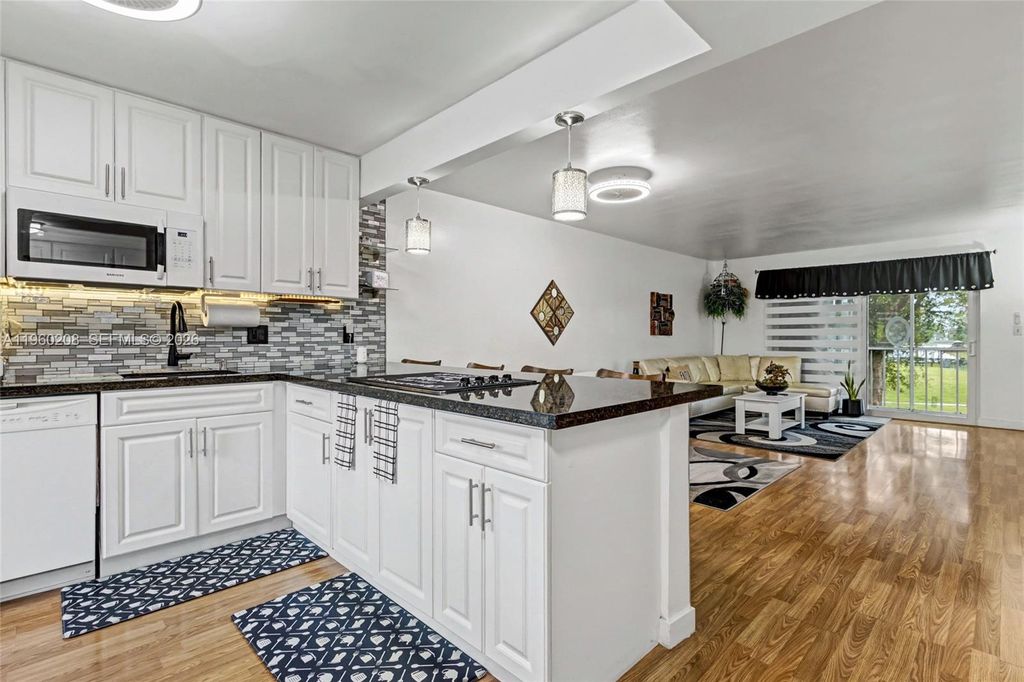 Photo of 5100 Washington St #207, Hollywood, FL 33021 (MLS # A11960208)