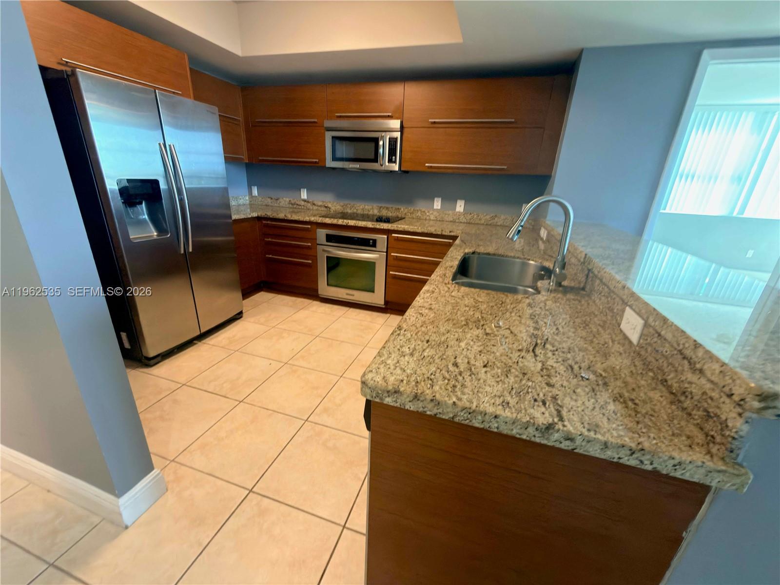 TAO SAWGRASS CONDOMINIUM - Residential