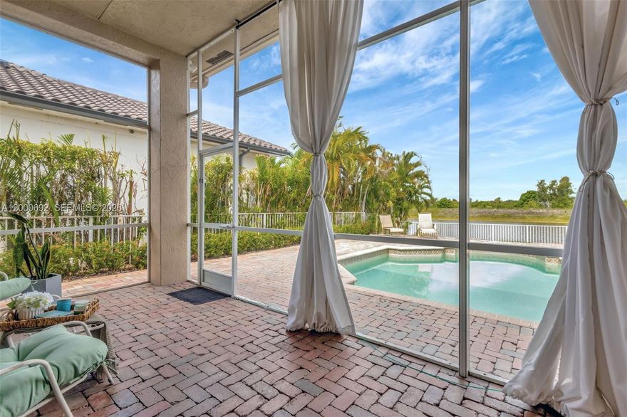 Welcome to your private waterfront retreat in the exclusive Grand Isle section of Sunset Lakes. This elegant 5-bedroom, 3-bath pool home offers expansive lake and preserve views from a serene screened-in patio—perfect for relaxing or entertaining. Inside, an open-concept layout connects spacious living areas to a beautifully updated kitchen, all filled with natural light. The primary suite features dual walk-in closets and a spa-style bath for ultimate comfort. Set within a gated community offering resort-style amenities and zoned for top-rated schools, this home blends everyday luxury with the ease of South Florida living. Low HOA includes cable, internet, & ADT Home Security. New AC. No HOA Approval process, easy to show.