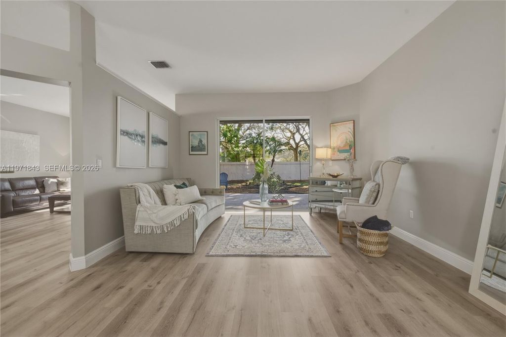 Photo of 12846 NW 18th Ct, Pembroke Pines, FL 33028 (MLS # A11971843)