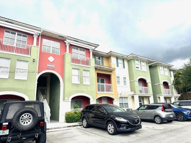 Don't miss this 3 bedroom and 2 1/2 bath townhouse in the heart of Doral, Fl. Laminate floors, spacious , walking closet, balcony and washer and dryer inside the unit. Vacant and very easy to show. Close to malls, restaurants, A+ schools and more...Clubhouse, Community Pool, Community Tennis Courts, Exercise Room, Maintained Community, Security Patrol, Street Lights. 2 assigned parking spaces + guest parking