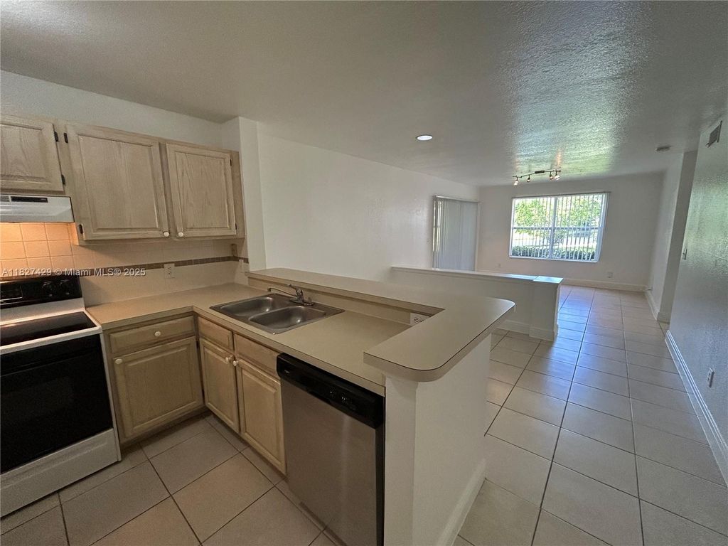 Photo of 1725 Palm Cove Blvd #2-101, Delray Beach, FL 33445 (MLS # A11827429)