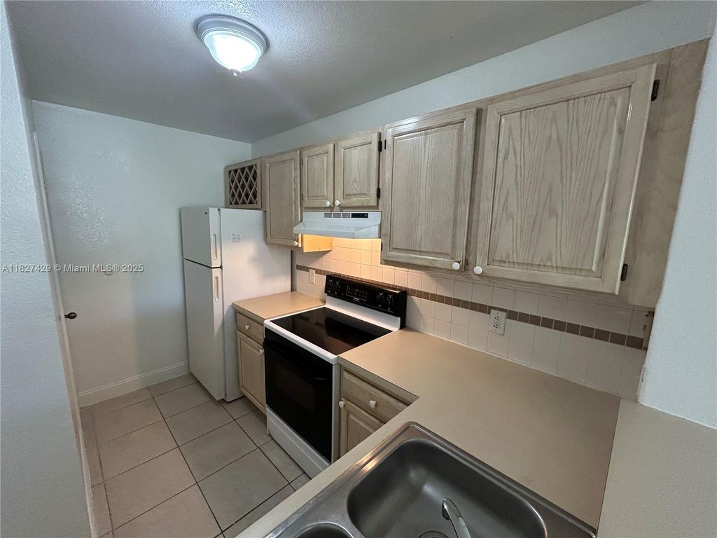 Photo of 1725 Palm Cove Blvd #2-101, Delray Beach, FL 33445 (MLS # A11827429)