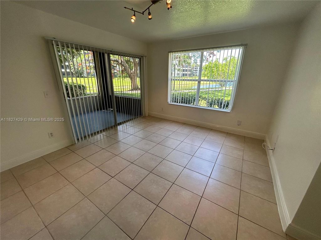 Photo of 1725 Palm Cove Blvd #2-101, Delray Beach, FL 33445 (MLS # A11827429)