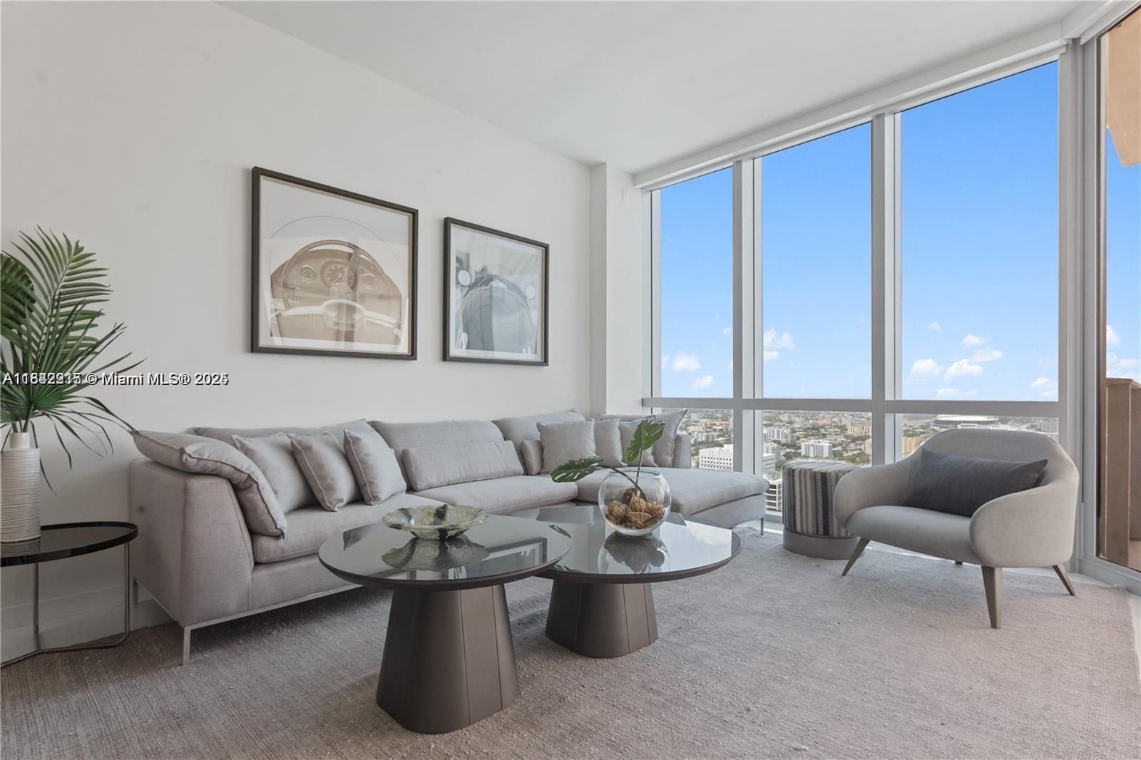 ABSOLUTE STEAL OF A UNIT AT PARAMOUNT MIAMI! The best priced deal in Paramount Miami for the coveted "06 line" huge 1bedroom plus den almost like a 2 bedroom with private foyer & elevator with fantastic sunset views. Features include: white tile floors, 10 ft high ceilings, high end chef kitchen w/ Italian Cabinets, Sub Zero & Bosch appliances, marble backsplash, huge kitchen island with tons of storage & more. The master bathroom feels like a spa with double vanities, soaking tub and large private shower, Take in the gorgeous views from your huge private terrace. Have access to resort amenities including basketball, tennis, gym, racquetball, game room, movie theatre, business center and more. Walk downstairs to restaurants including museum of ice cream & sixty vines recently open.
