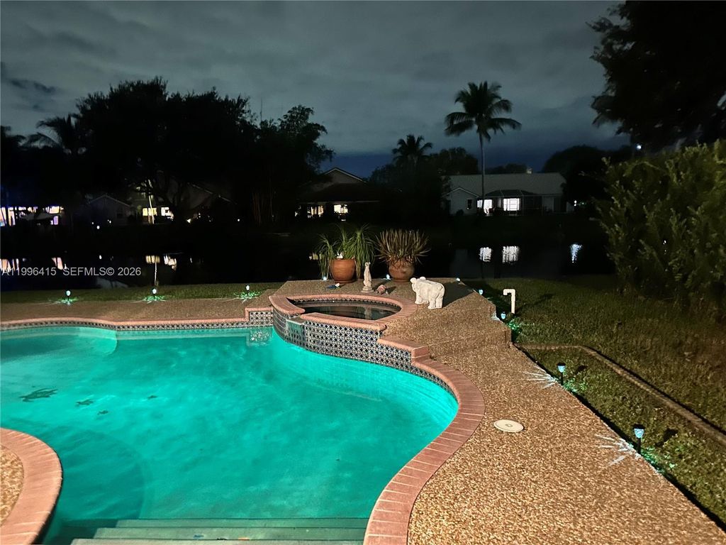 Photo of 9481 Oak Grove Cir, Davie, FL 33328 (MLS # A11996415)