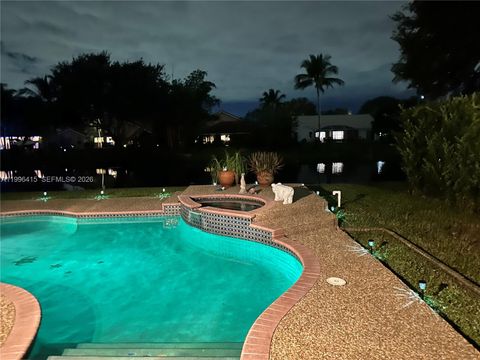 Photo of 9481 Oak Grove Cir, Davie, FL 33328 (MLS # A11996415)