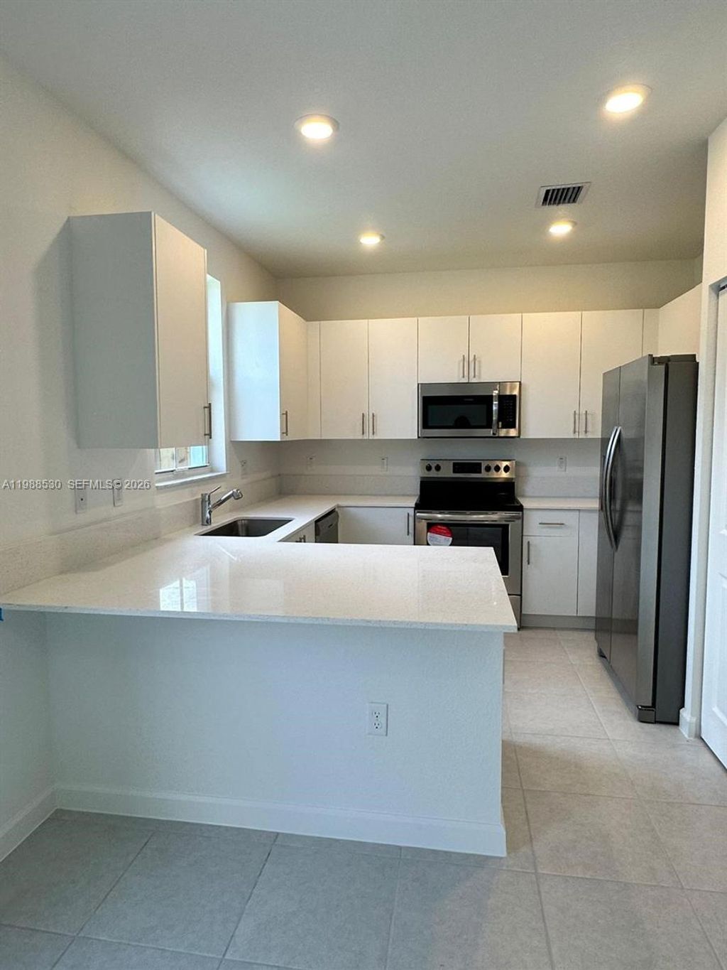 Photo of 11965 NW 47th Mnr, Coral Springs, FL 33076 (MLS # A11988530)