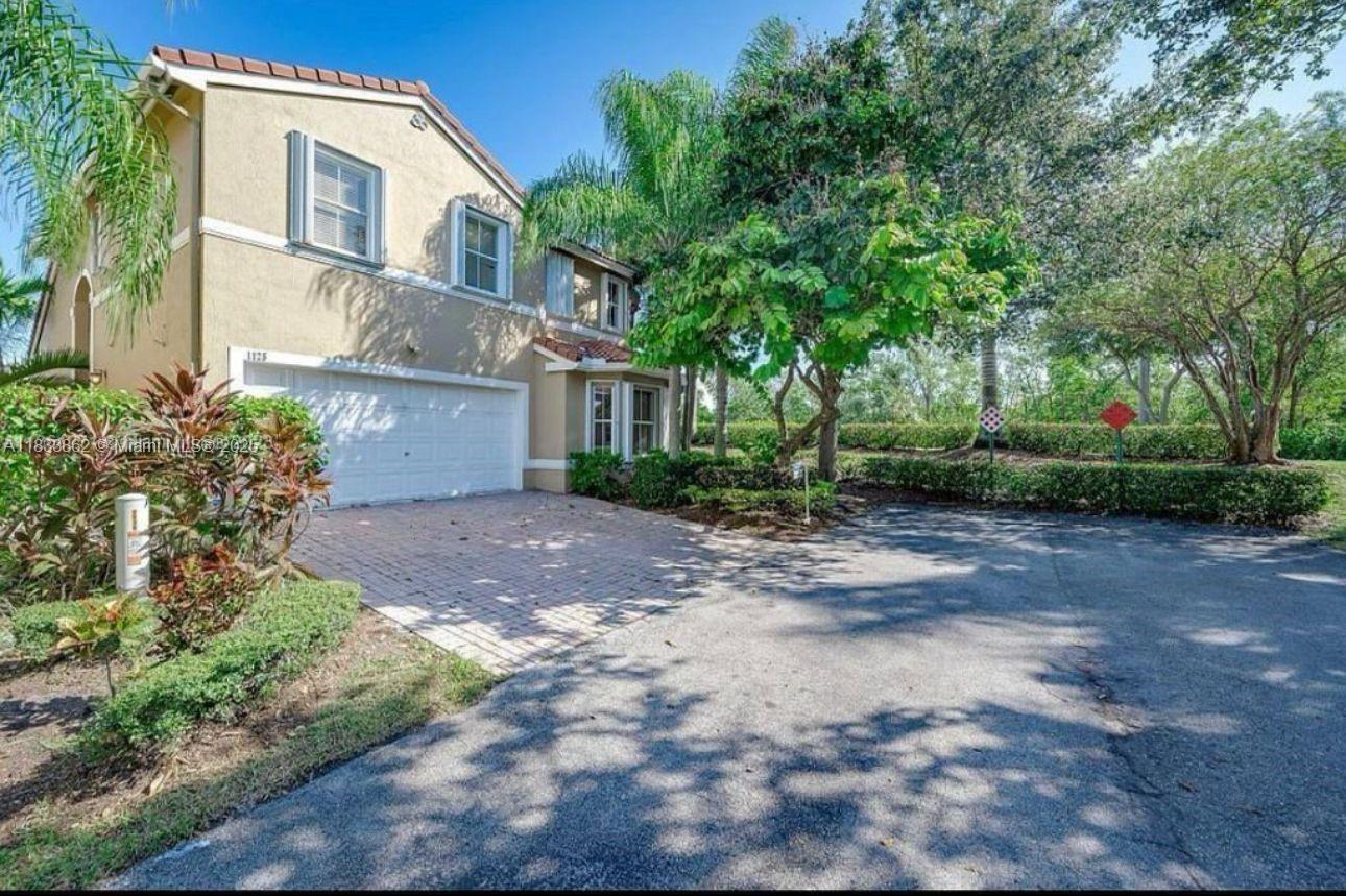 Located on a desirable corner lot with canal access, this well-maintained home offers privacy and curb appeal. In the gated West Lake Village, this 3-bed, 2.5-bath SFH features the community’s most popular floor plan with a spacious living room, double-height ceilings, open kitchen with granite countertops, ample cabinetry, and a 2-car garage.
Enjoy direct access to the canal — ideal for kayaking or relaxing by the water. Just one mile from the beach and close to shopping, dining, and entertainment.
Amenities include a new gym, heated pool, spa, tennis courts, playgrounds, dog parks, and 24/7 security — all for a low HOA of $370/month.
Minutes from Hollywood Beach and downtown. Inspection report available.