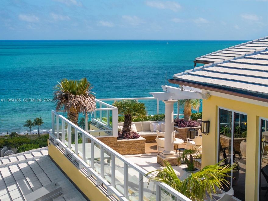 High above the turquoise waters of Key Biscayne rises a penthouse that simply cannot be replicated. Once featured in Architectural Digest, this legendary corner residence at Grand Bay is a statement of scale, design, and presence. From sunrise over the Atlantic to glittering sunsets across Biscayne Bay and the Miami skyline, the views are cinematic in every direction, offering endless blue water, golden light, and exceptional privacy. Spanning an extraordinary 8,435 square feet under air and 2,825 square feet of terraces, totaling 11,260 square feet as per the developer’s floor plan, the residence is defined by soaring 12-foot ceilings and grand proportions throughout. A dramatic foyer leads to a spectacular Grand Room designed for both intimate living and large-scale entertaining. The formal dining room is separate and elegant, while the completely remodeled kitchen and family room provide comfort and functionality. The fully renovated private library and custom bar enhance the home’s entertaining appeal. The primary suite is serene and expansive. All the bathrooms have just been completely remodeled, offering a fresh spa-inspired experience finished to today’s highest standards. Four (4) additional en-suite bedrooms ensure comfort and privacy. The terraces offer expansive outdoor living in the sky, perfect for sunrise mornings and sunset evenings overlooking the water and skyline. This is not simply a penthouse. It is a landmark residence, rare and impossible to duplicate.