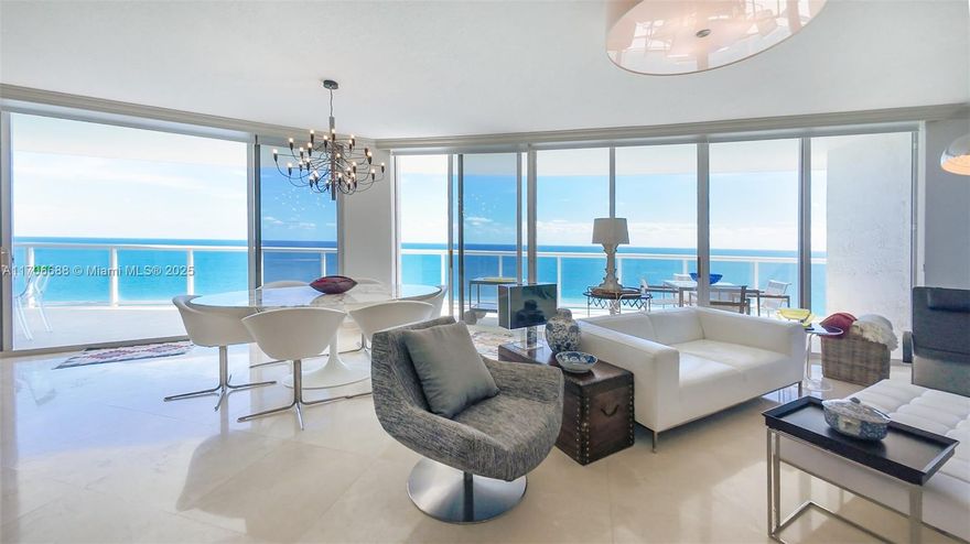 Spectacular view from the 31st floor, 3 beds + den, 3.5 baths unit with panoramic views of the ocean and intracoastal / 2,230 sq. ft of living area / Updated Kitchen with modern appliances and built in expresso machine / The den can be used as an additional bedroom / Private elevator takes you directly into your foyer / Marble floors through out the apartment / Built in closets / 2 assigned parking spaces / Building features: fully renovated lobby, heated pool, Jacuzzi, two story gym, sauna, tennis court, beach service, party room, business center, and much more! Watch the drone video on the virtual tour link.