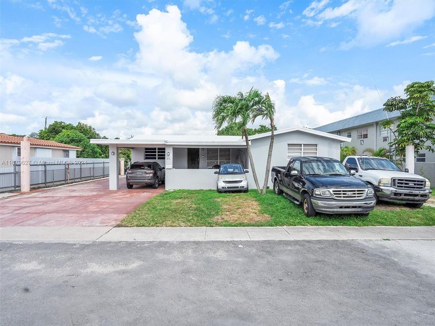 This exceptional property offers versatile development potential !!! You can build up to 9 units from scratch, or keep the existing house, which features 4 bedrooms and 2 bathrooms, along with an separate efficiency unit that has 2 bedrooms and 1 bathroom. 
Alternatively, with City Permits, there's the opportunity to create a Brand-New Building with 9 units for sale or rent. 
For more details, please feel free to contact me. Thank you