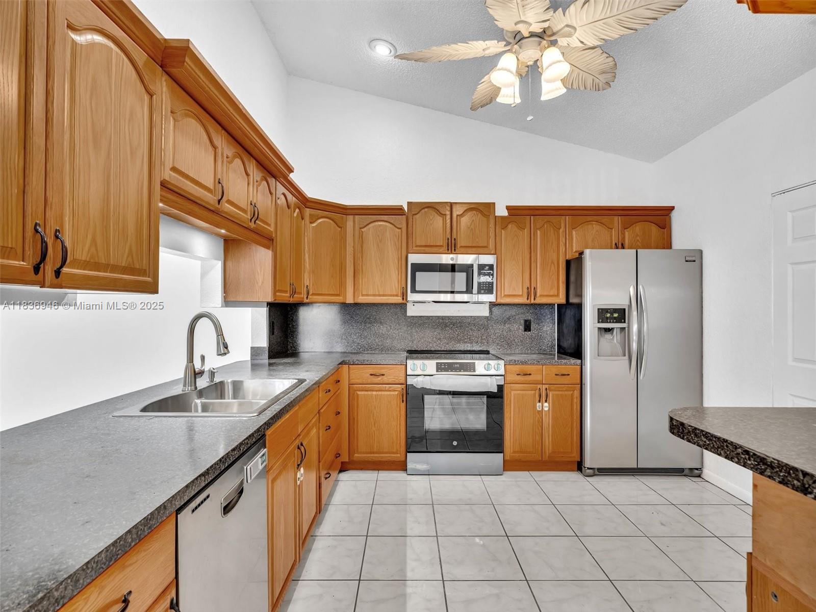 Ideal location! Small, well-maintained community in Key North, Dania Beach. A hidden gem! Steps from Publix, shopping, restaurants, and Hard Rock Airport. Close to all highways (I-95 and the Turnpike), schools, and places of worship. Brand new, high-end appliances. The fourth bedroom is used as a family room/study. Large walk-in closet in the master bedroom. The only and largest unit available in Key North. Hurry, won't last!