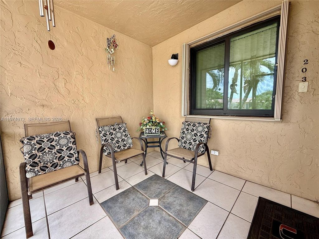 Photo of 318 Lakeview Dr #203, Weston, FL 33326 (MLS # A11974972)