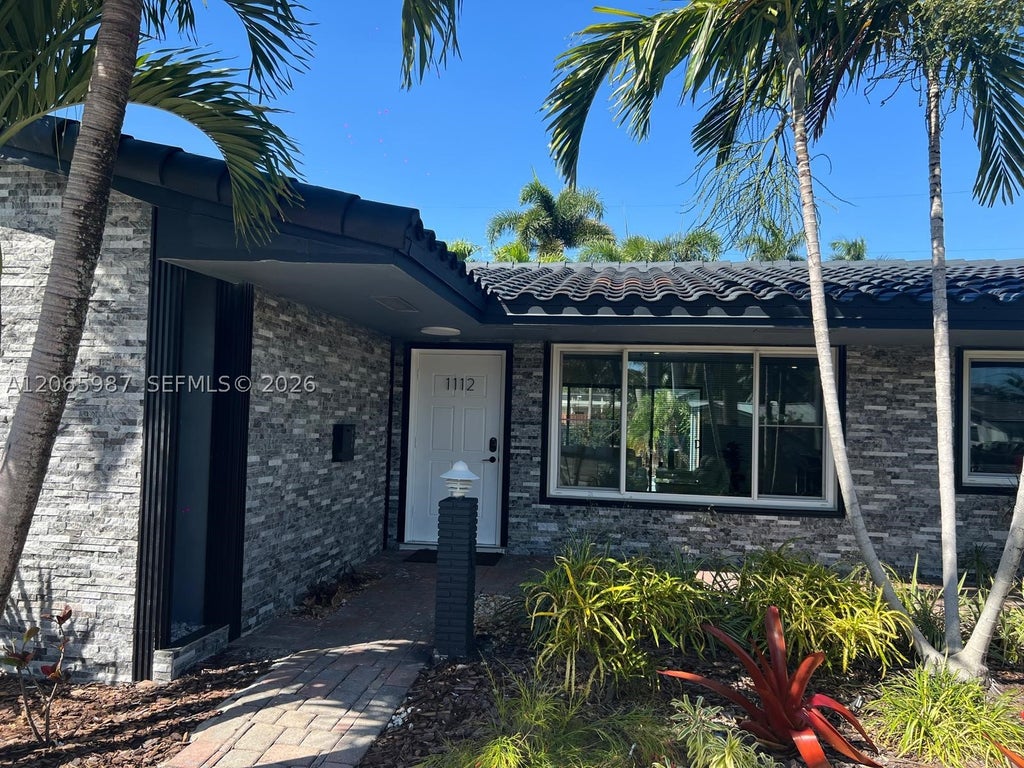 Photo of 1112 N 13th Ave, Hollywood, FL 33019 (MLS # A12065987)