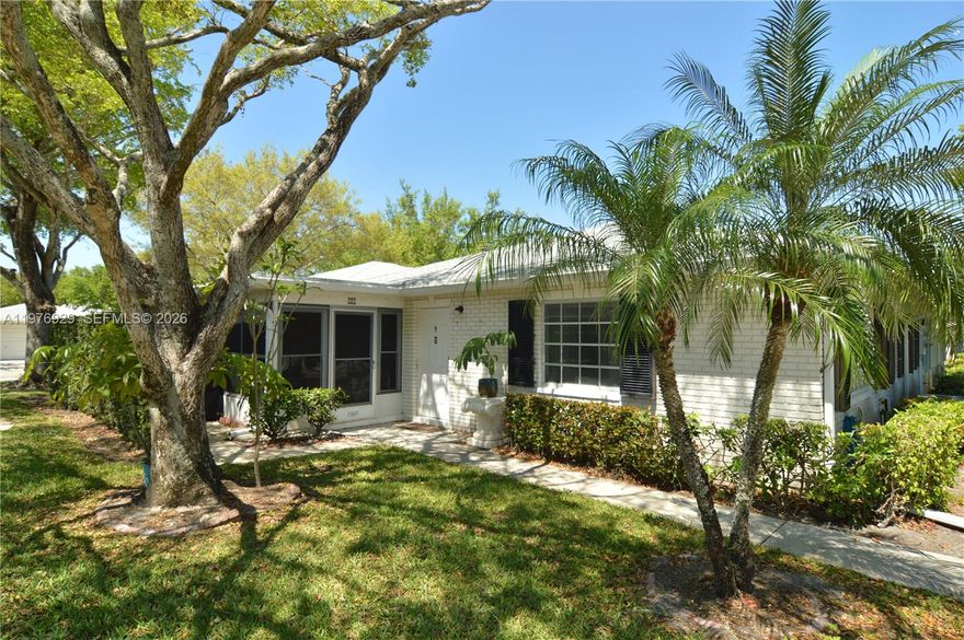 Condo features tile flooring throughout the kitchen, living room, and bathrooms, elegant travertine flooring in the main bathroom, and water-resistant laminate flooring in both bedrooms and the enclosed patio. The updated kitchen offers brand-new stainless steel appliances (including washer and dryer; microwave excluded). The A/C system is a TRANE unit with a newer exterior condenser. Additional upgrades include updated bathrooms with a bubble bathtub in the primary suite, newer roof, newer water heater, fresh interior paint, and popcorn ceilings fully removed for a modern finish.

Enjoy abundant natural light, especially during the morning hours, in the bright living spaces and the plexiglass-enclosed Florida room — perfect for relaxing, reading, or painting. The property includes two assigned parking spaces for added convenience

This villa is a short walking distance to the east pool as well as main pool near clubhouse. One small pet is welcome, making it easy to bring your companion along. Residents of Limetree enjoy true resort-style amenities, including three heated and chilled pools, pickleball courts, bocce ball, and a fitness center.
Minutes from shopping, medical centers, I-95, and the Florida Turnpike, this home offers both tranquility and accessibility 15 minutes driving from the beach.