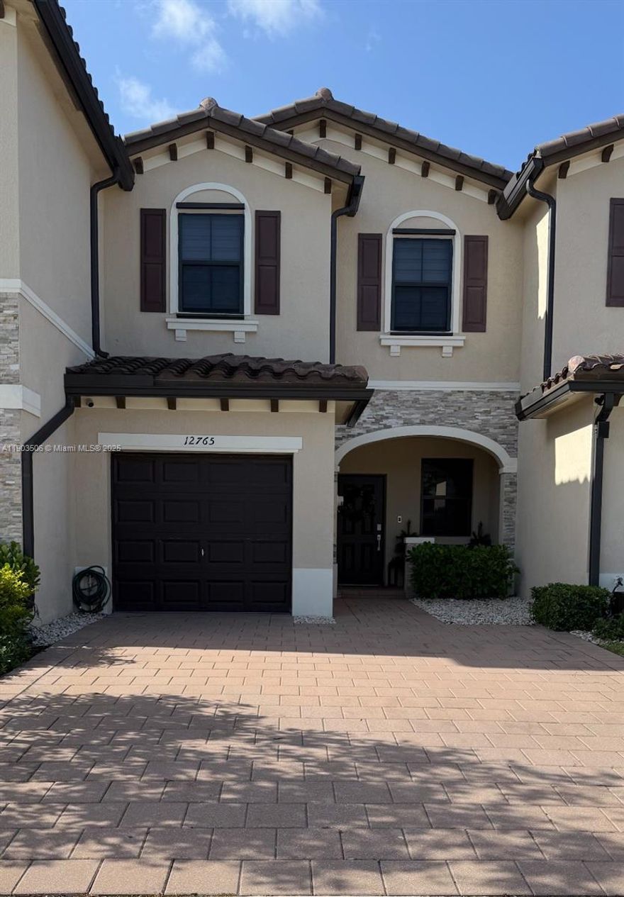 Stunning 3 Bedroom Townhouse in a Prime Location! Spacious open living concept with a garage and outdoor patio. Beautiful kitchen with stainless steel appliances. This home will not last!