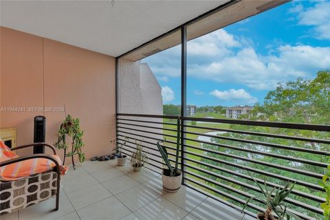 Photo of 2981 N Nob Hill Rd #406, Sunrise, FL 33322 (MLS # A11944241)