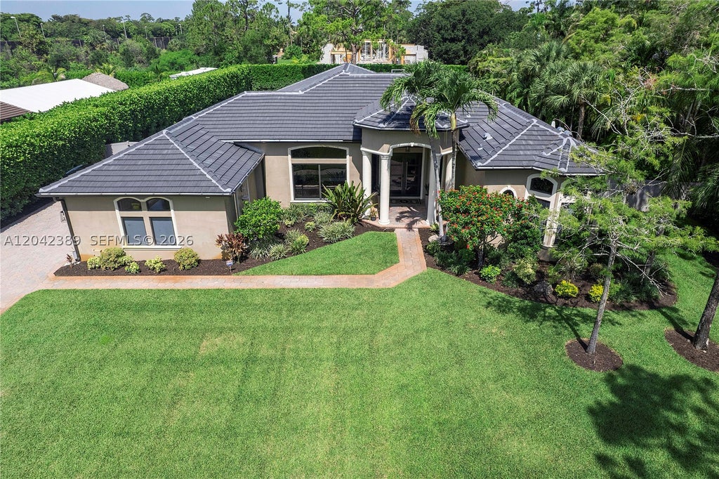 Photo of 5755 NW 72nd Way, Parkland, FL 33067 (MLS # A12042389)