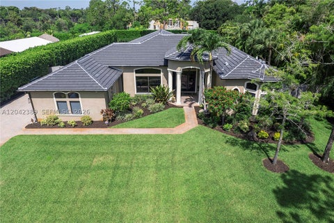 Photo of 5755 NW 72nd Way, Parkland, FL 33067 (MLS # A12042389)