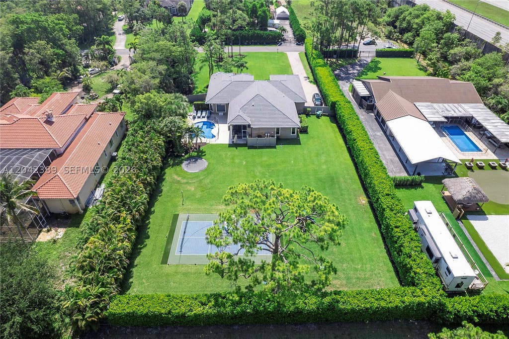 Photo of 5755 NW 72nd Way, Parkland, FL 33067 (MLS # A12042389)