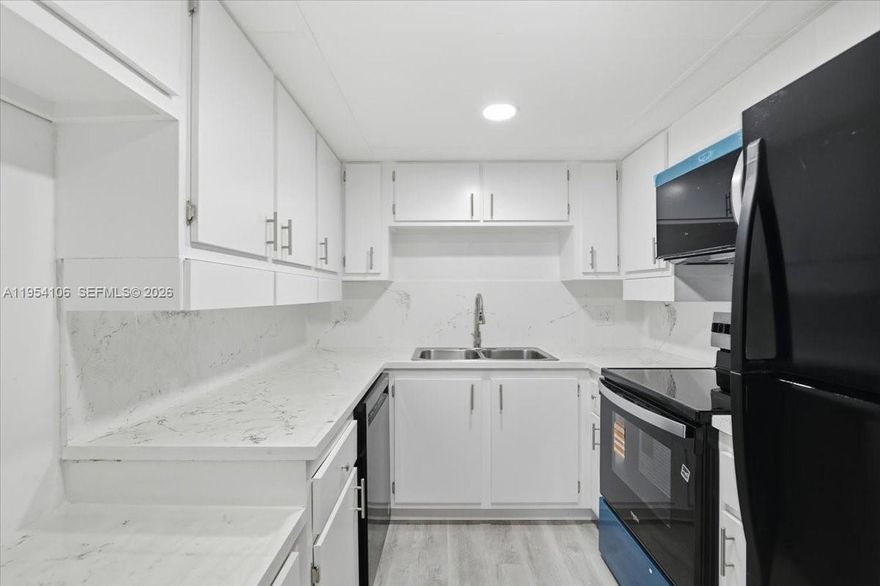 Fully renovated unit with nothing speared! Laminate floors and stainless steel appliances. Building offers laundry facilities on every floor. Enjoy the updated pool which is adjacent to the building and lush landscaping. HOA requires a minimum 675 credit score with no minimum down payment. 
Don’t miss this move-in ready gem! Won't Last!